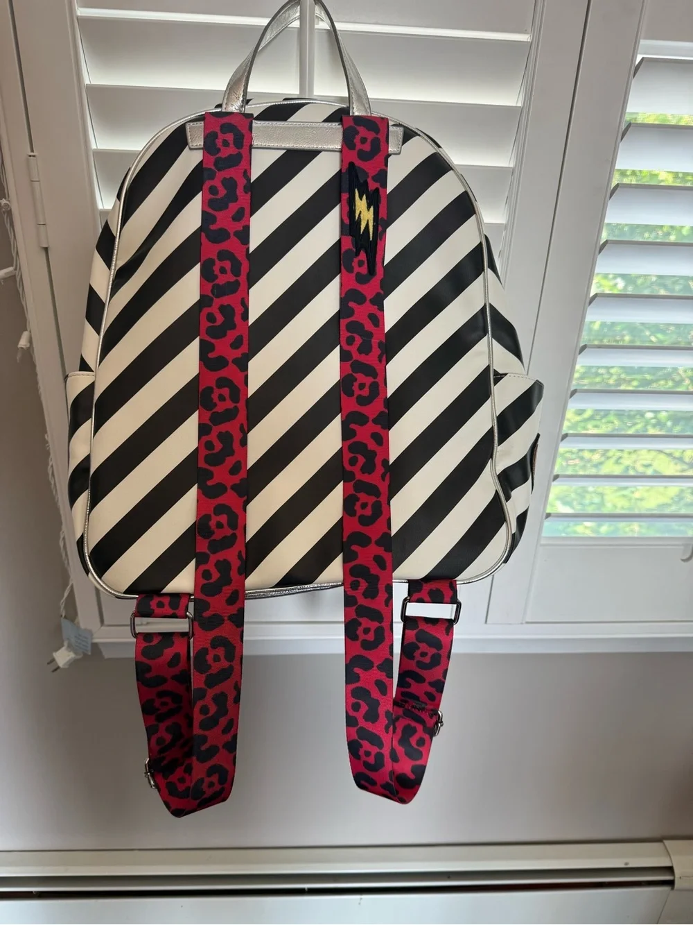 Betsey Johnson Backpack with leopard straps- Black and White